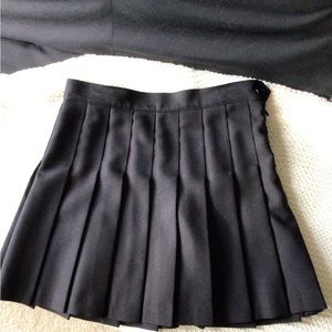 American Apparel black pleated mini skirt size med.